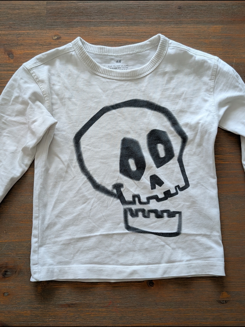 H&M White Long-Sleeve Tee with Black Skull Graphic
